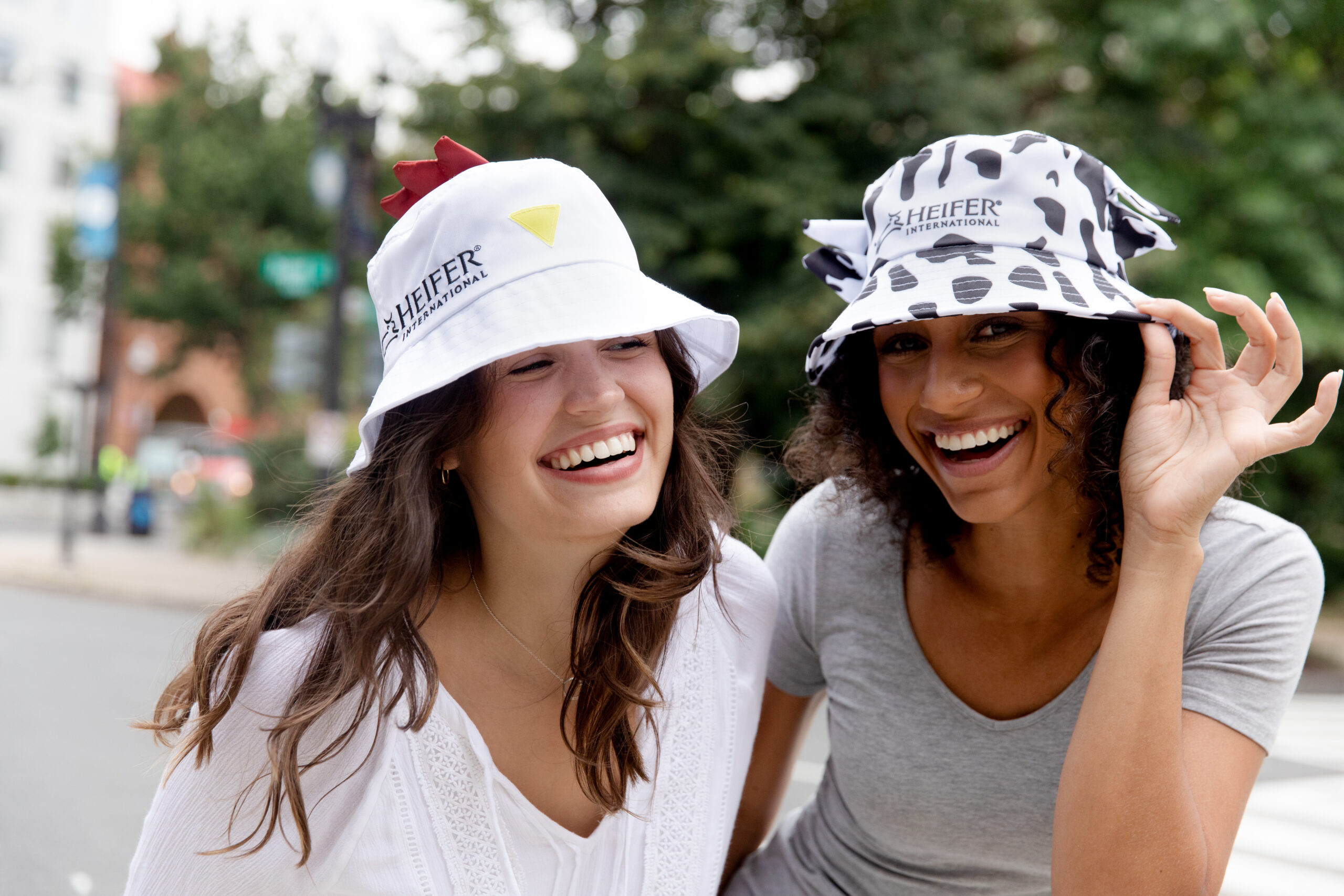 Women in Cow and Chick Hats