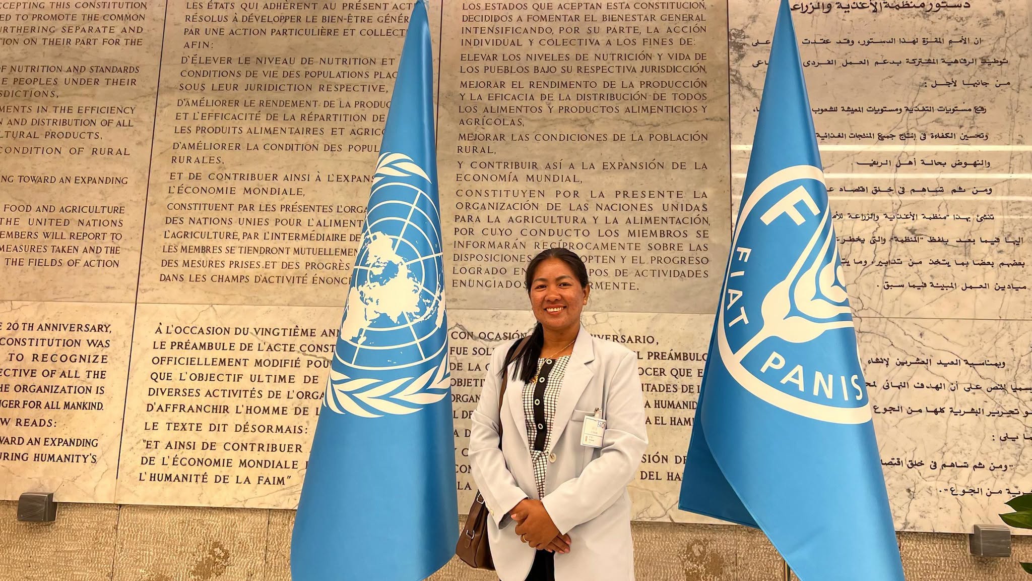 Set Hach stands between United Nations and Food and Agriculture Organization (FAO) flags at FAO headquarters in Rome, Italy.