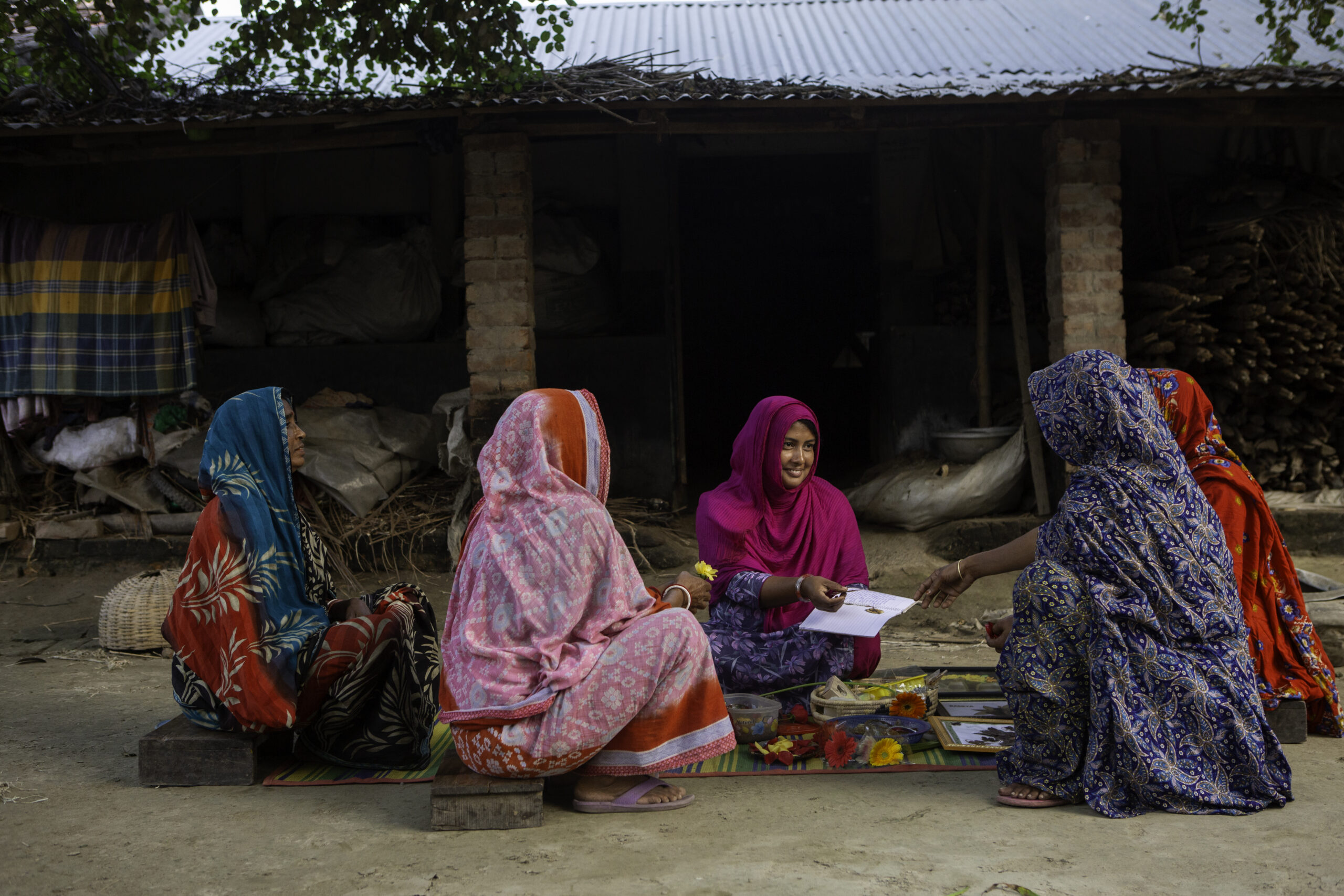 Women gather in a village in Bangladesh to share knowledge and discuss income opportunities.
