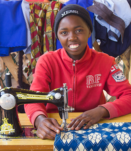 Daughter with her sewing machine.