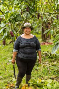 Damariz Robles credits her orchard's abundance to continual innovation and learning. Photo by Joe Tobiason.