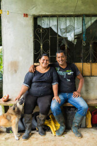 Robles, with her husband, Gualberto Garcia, and her dog, Rufo. Photo by Joe Tobiason.