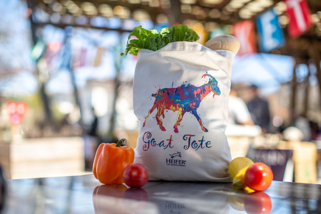 Heifer's Goat Tote shown at a farmers market.