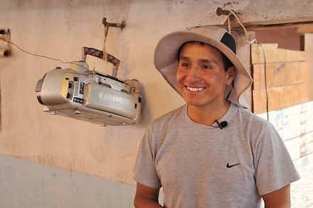 Edgar Ccolque Quispe plays music to calm his guinea pigs.