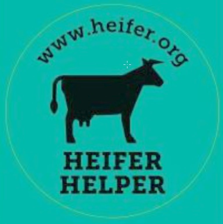 A sticker with a cow on it.