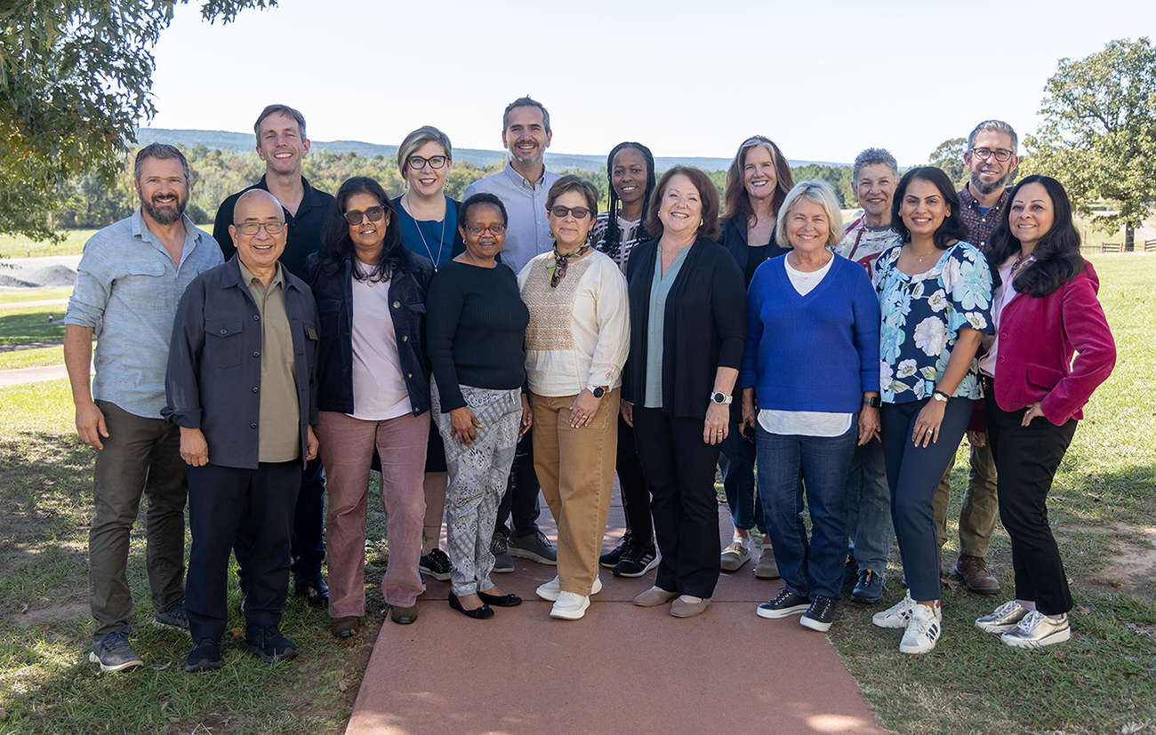 Heifer International’s board members and President and CEO, Surita Sandosham, pose for a group photo at the Heifer Ranch during their annual meeting on October 21, 2025.