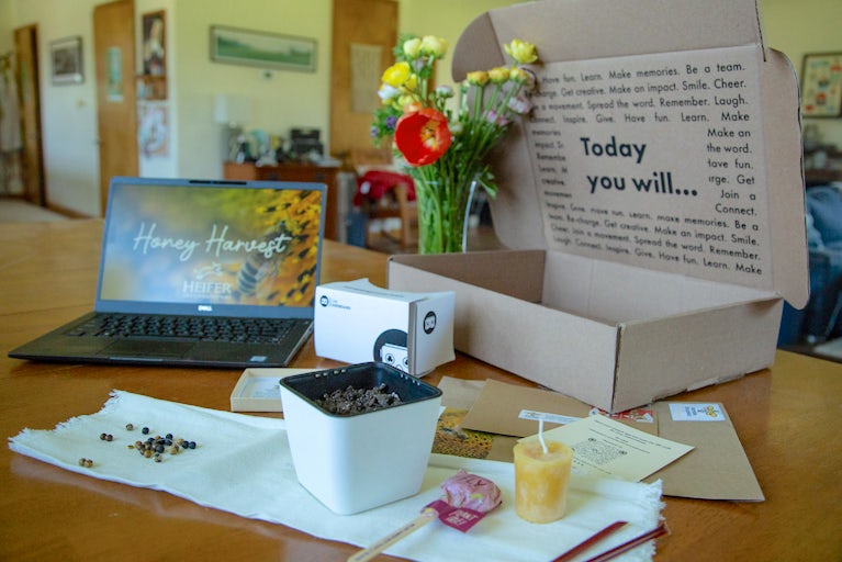 flowers and other items sitting on a desk.