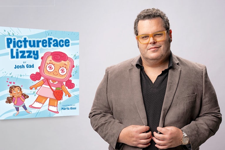 Josh Gad with his book.