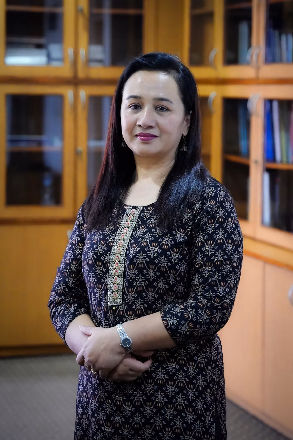 Headshot of Neena Joshi