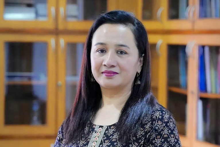 Headshot of Neena Joshi