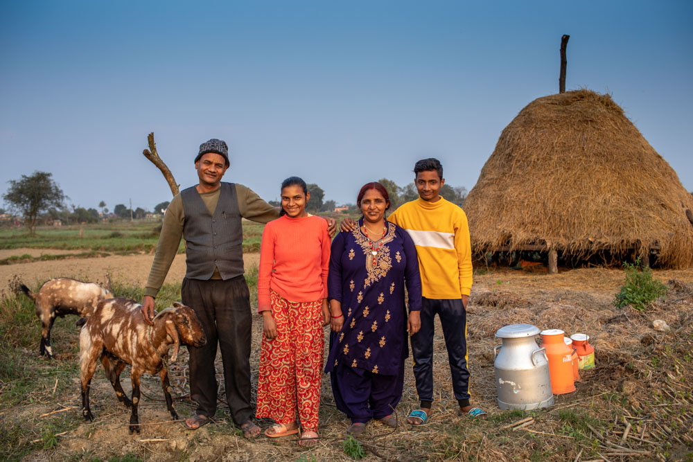Nepali Family Stands Infront of their house