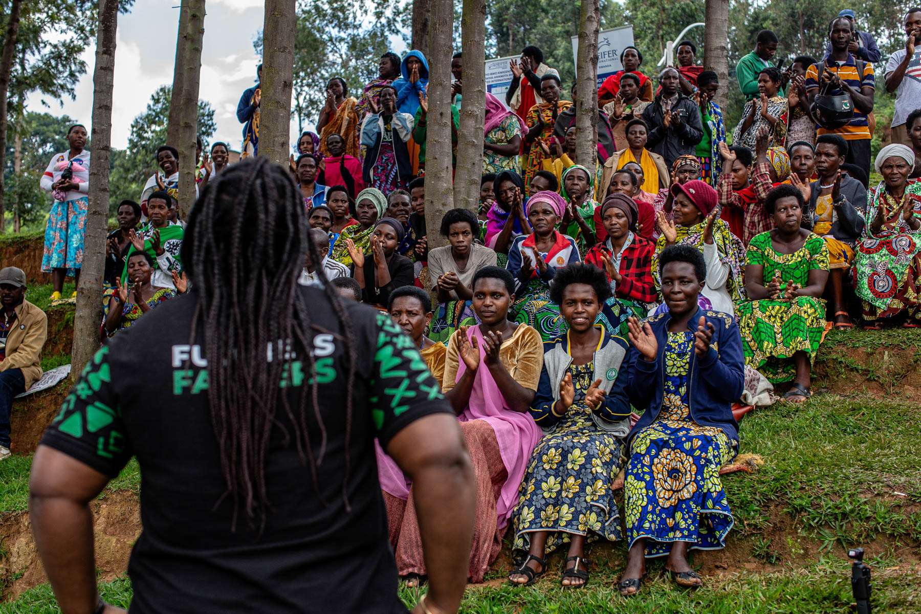 Farmers gather at community ceremony in Rwanda.