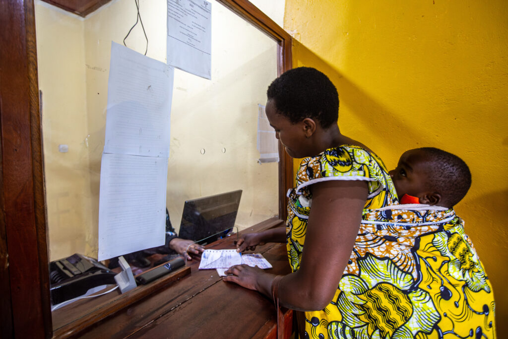 A woman completes a financial transaction.