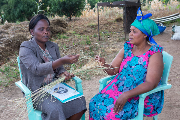 Sylvania Monthe talks to Josephine about different types of fodder.