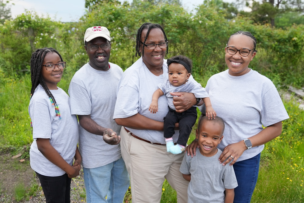 A family poses for a portrait.
