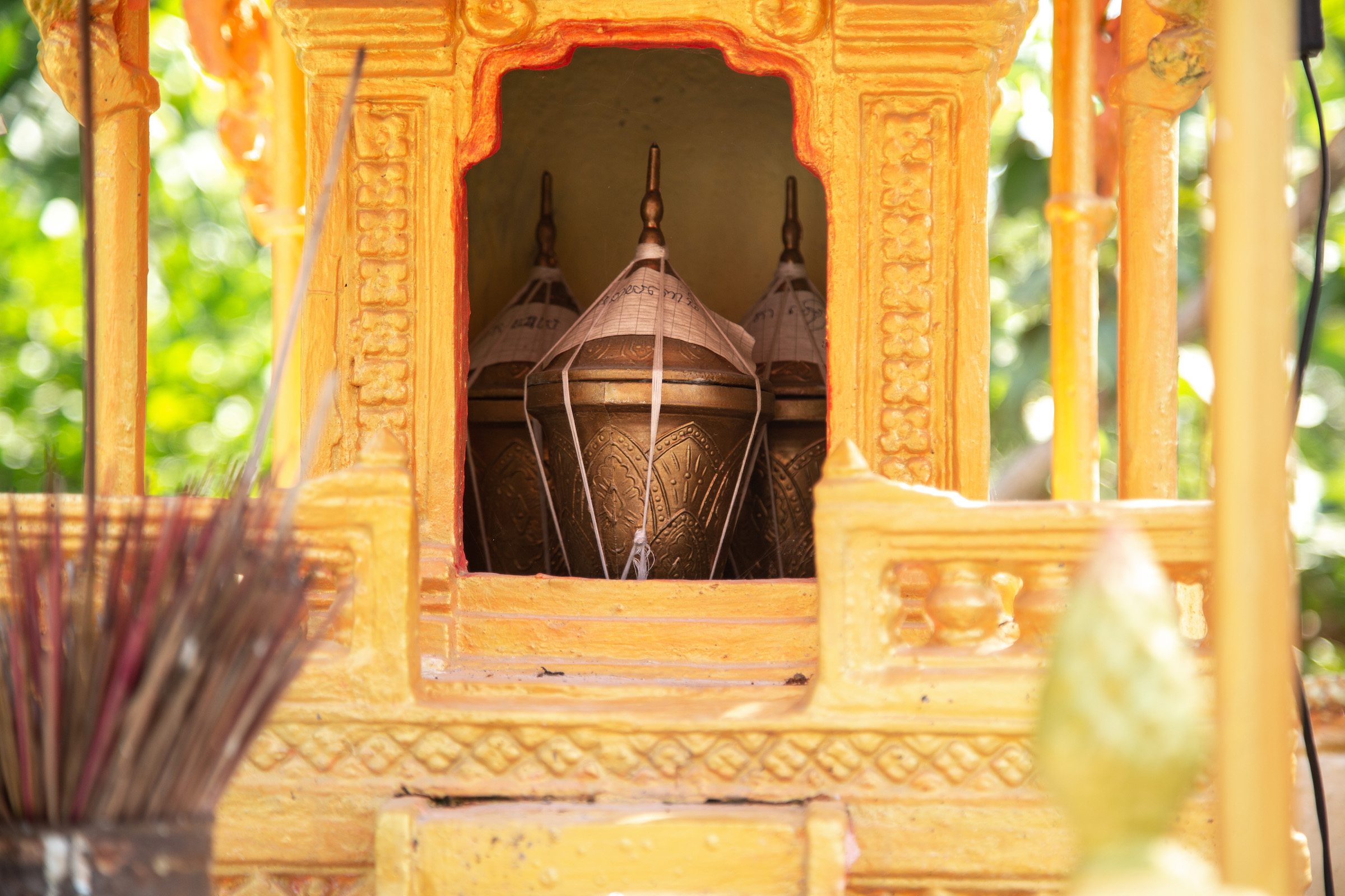The ashes of the departed are placed inside spirit houses seven days after death.