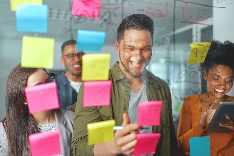 a group of people works on a project together.