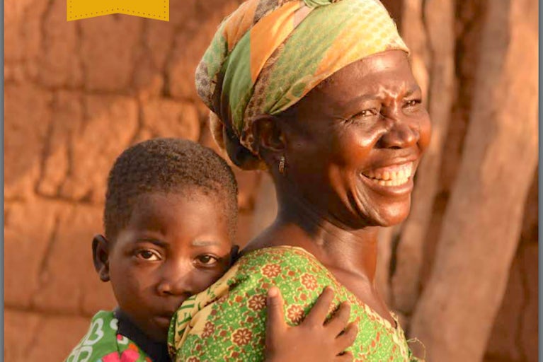 Cover for the 2018 annual report featuring a smiling woman with a child on her back