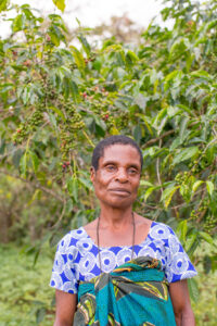 Coffee farmers like Guli Siwale in Tanzania often struggle to reach a living income. 