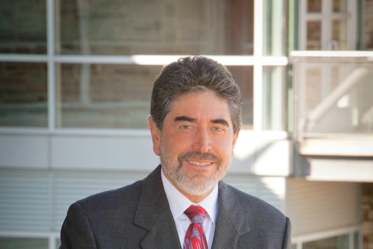 Oscar Casteneda, Senior Vice President of the Americas Programs, professional headshot.