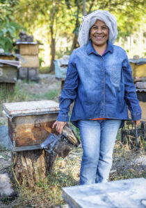 Lubia Aguilar Gonzalez, in an apiary she manages with other members of her cooperative. 