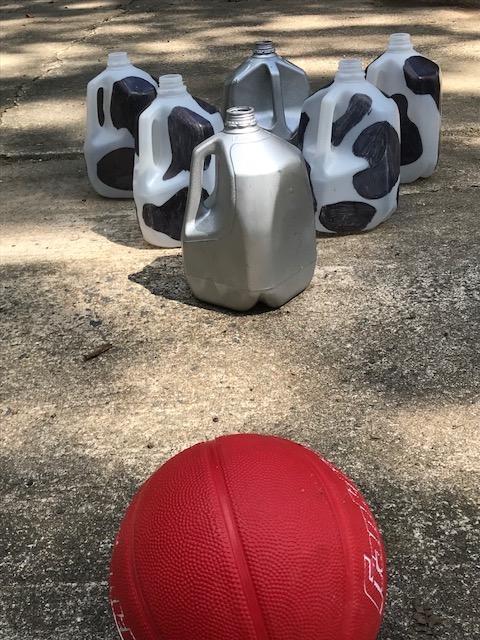 This project works as a fun example of up-cycling, too! Milk jug bowling set.