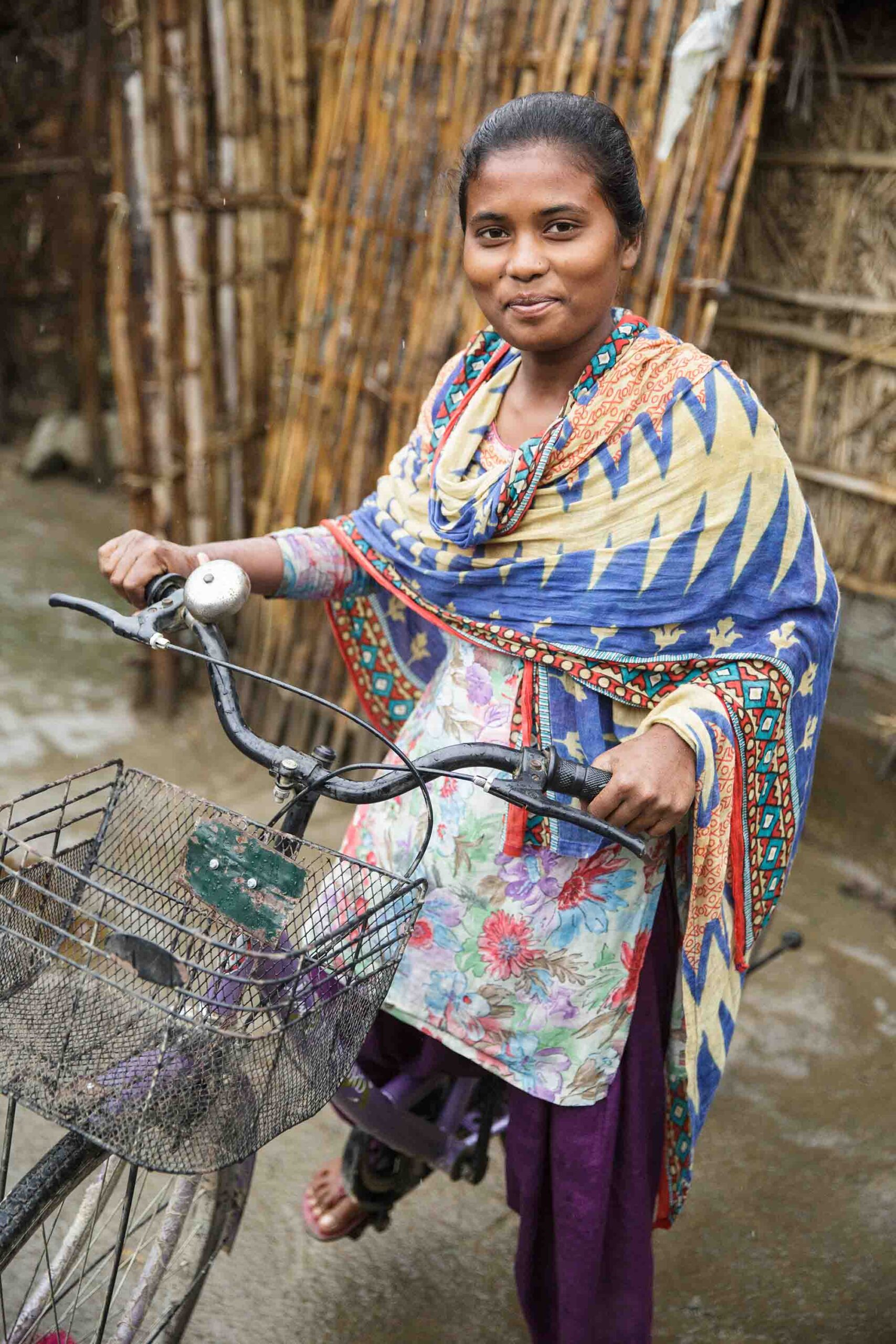 Rashmi Nandan Kisku, 18, was the first girl to ever ride a bicycle in her village. Rashmi Kisku rides her bicycle.