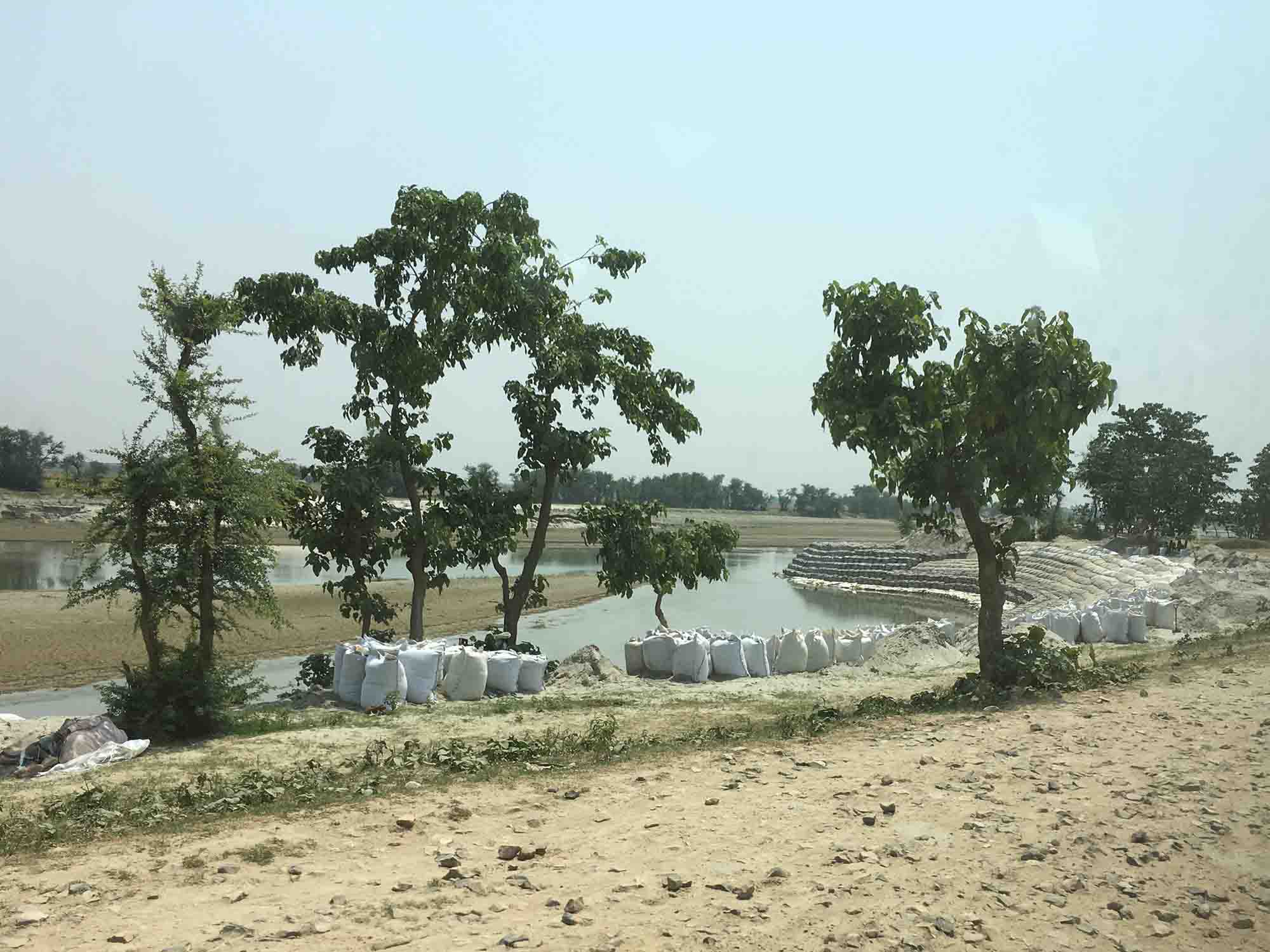 Sandbags line the banks of the Kosi river and its tributaries in anticipation of monsoon season. Sandbags line the banks of the Kosi river and its tributaries in anticipation of monsoon season.