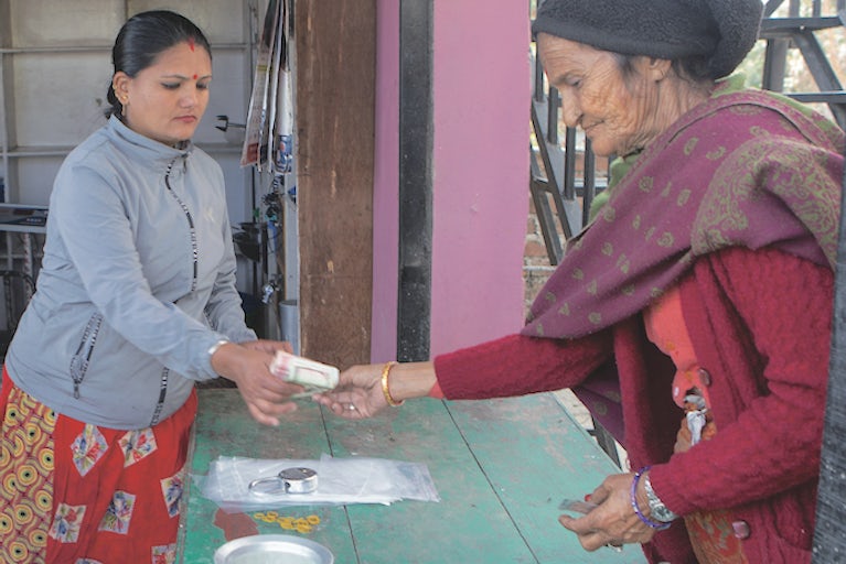 Women exchanging money.