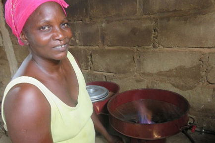 Yacine with the family's new biogas stove.