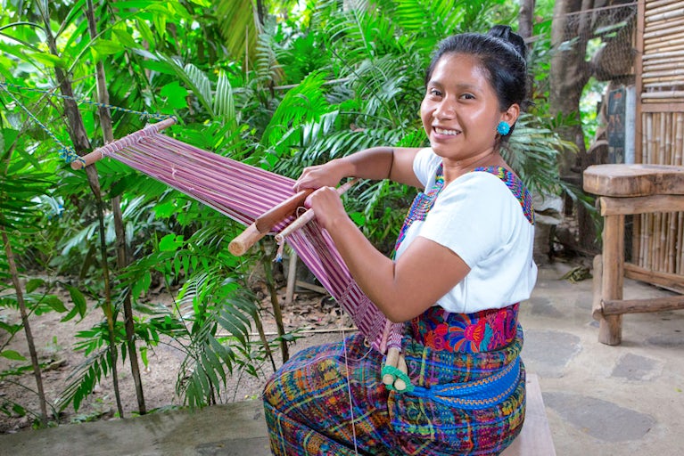 Woman working with fabric.
